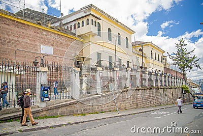 QUITO, ECUADOR - NOVEMBER 23, 2016: Unidentified people walking at outside, in the old prison Penal Garcia Moreno in the Editorial Stock Photo