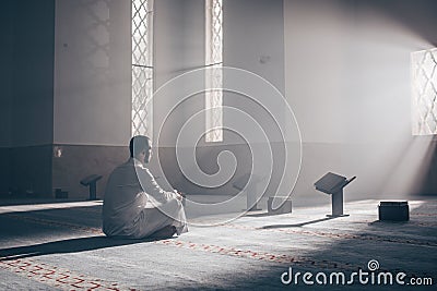 Quran - holy book of Islam mosque Muslim in mosque enuntiat Quran in Ramadan Editorial Stock Photo