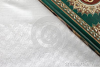 The Quran literally meaning the recitation, is the central religious text of Islam Stock Photo