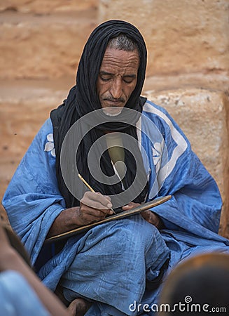 Quran teacher at work Editorial Stock Photo