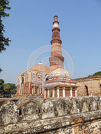 The Qutb Minar is the tallest brick minaret in the world and is located in the city of Delhi. India. It is an UNESCO World Heritag Stock Photo