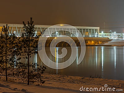 RÄ«gas HES hydroelectric power plant at night time Stock Photo