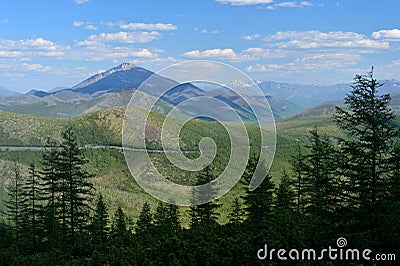 Summer view of the mountain pass Olchan. Oymyakon, Yakutia. Ð¢he Federal highway `KolymaÂ» P504 Stock Photo