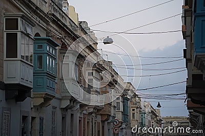 Rabat medieval village street view building in Malta painted bow windows Editorial Stock Photo