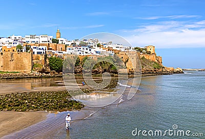 RABAT, MOROCCO - APRIL 09, 2016: An unidentified person fishing Editorial Stock Photo