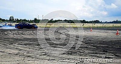 Race car racing on a track with motion blur Stock Photo