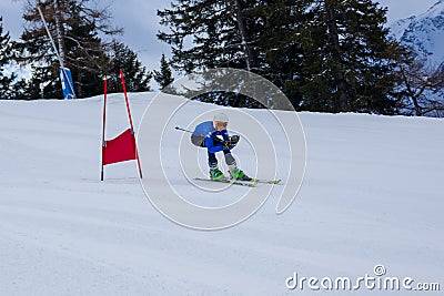 Race time, skier is going down the hill, Ponte di Legno Editorial Stock Photo