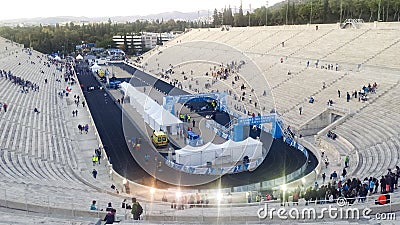 Races passing the finish line at the Athens Authentically Marathon on Panathenaic Stadium Stock Photo