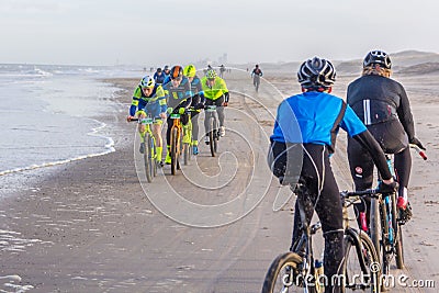 Racing bike competition riders in beach Editorial Stock Photo