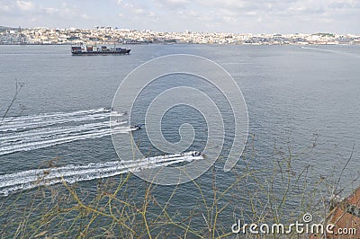 Racing boats in Tejo river Lisbon Stock Photo