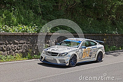 Racing car Mercedes-Benz C63 AMG (2012) in Mille miglia 2016 Editorial Stock Photo