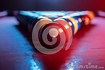 Rack of colorful billiard balls arranged on pool table. Stock Photo