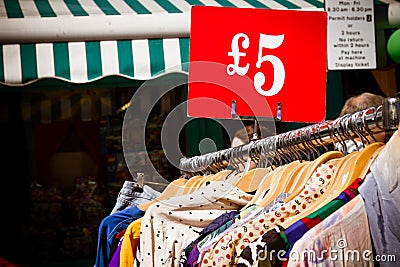 Rack of dresses at market Stock Photo