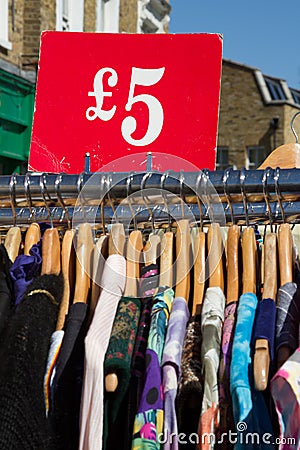 Rack of dresses at market Stock Photo