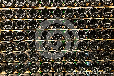 Racks with bottled wine in plant storage Stock Photo