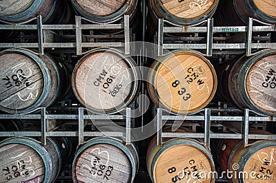 Racks of new and old oak barrels used for wine maturation Editorial Stock Photo