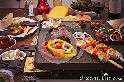 Raclette table-top grill or the Dutch variant 'gourmetten' Stock Photo