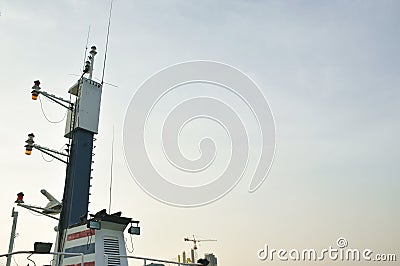 radar and sonar at ship rooftop in river on sunset Stock Photo