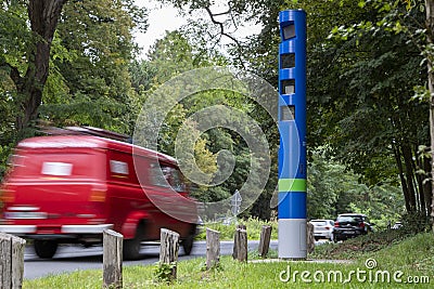 Radar speed trap with car in motion Stock Photo