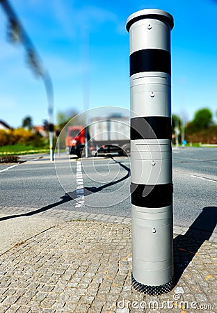 Radar system for measuring speed at an intersection in Germany Stock Photo