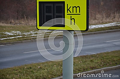 Radar to measure the speed of vehicles in the city. A reflective green sign on a pole with LED light numbers informs car drivers h Stock Photo