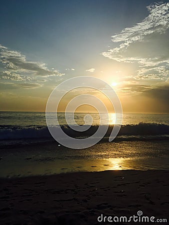 Radiant Beach Sunset Stock Photo