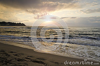 Radiant sea beach sunrise Stock Photo