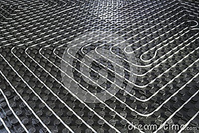 Radiant underfloor heating flexible tubing Stock Photo