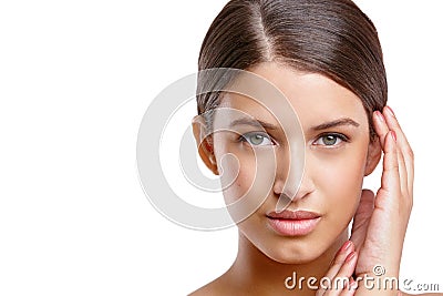 Radiantly beautiful. Studio portrait of a beautiful young woman with flawless skin. Stock Photo