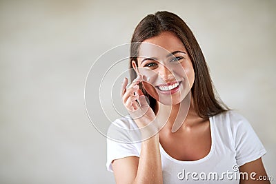 Radiantly healthy skin. Portrait of a beautiful woman applying moisturizer to her perfect skin. Stock Photo