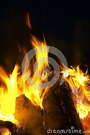 Radiate Campfire Against Black Night Sky Stock Photo