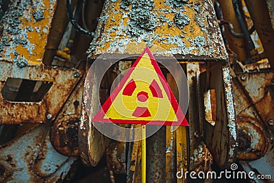 Radiation Sign - triangular warning yellow sign of radiation hazard in the zone of radioactive fallout in Pripyat city Stock Photo