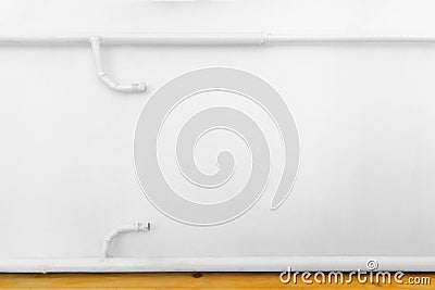 Radiator connections in room Stock Photo