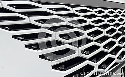 Radiator grille pattern. Car radiator grill close up. Chrome grill of big powerful car engine Stock Photo