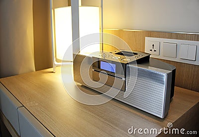 Radio ipod dock on a sidetable Stock Photo