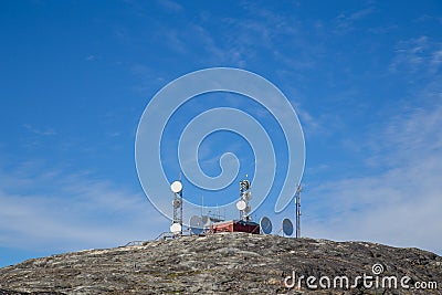 Radio and Satellite Antennas in Ilulissat, Greenland Editorial Stock Photo