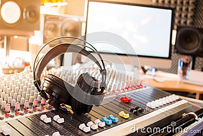 Radio station: Headphones on a mixer desk in an professional sound recording studio Stock Photo