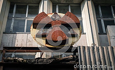 Radioactive symbol on the facade of the building in Chernobyl Stock Photo