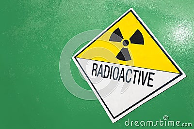 Radioactive Warning Sign on a Green Container Stock Photo
