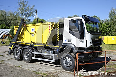 Radioactive waste storage container loaded on a truck crane Editorial Stock Photo