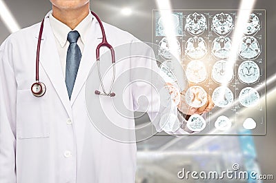 Radiologist doctor touching film brain MRI. Stock Photo