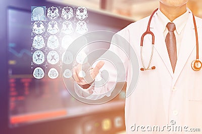 Radiologist doctor touching film brain MRI Stock Photo