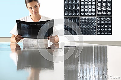 Radiologist woman checking xray, healthcare, medical Stock Photo