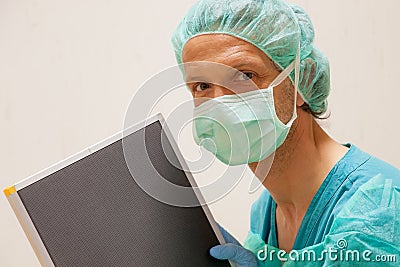 radiology technician with radiographic cassetteGoogle Traduttore Stock Photo