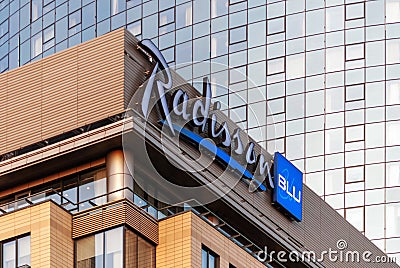 Radisson blu hotel logo on modern hotel facade Editorial Stock Photo