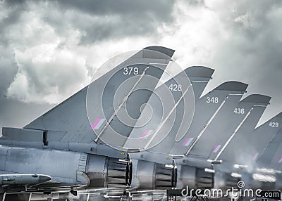 RAF Coningsby Modern Typhoon Eurofighter military combat jet fighters aircraft stationary five in a row with engines running heat Editorial Stock Photo