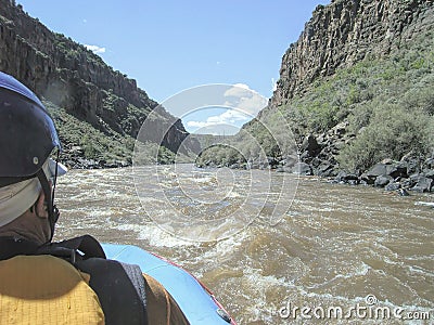 A Rafter Tackles the Taos Box Portion of the Rio Grande River in New Mexico, USA Stock Photo