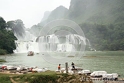 Rafts at Ban Gioc or Detian Waterfall, Vietnam - China Editorial Stock Photo