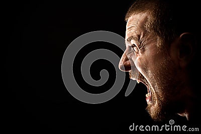 Rage - scream of angry man Stock Photo