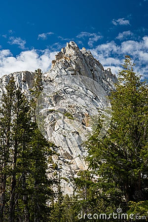 Ragged Peak Glows Bright White In The Late Morning Sun Stock Photo